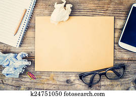 Desktop mix on a wooden office table.