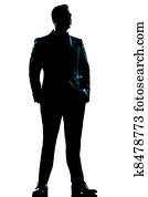one caucasian  business man  handsome full suit standing full length serious silhouette in studio isolated white background