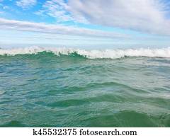 Sea waves reaching lapping to shore