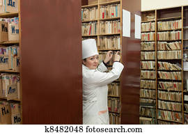 Nurse searching  medical chart  