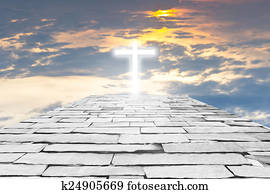 Brick road to a transparent cross giving out heavenly light on t