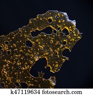 cima, detalhe, de, marijuana, óleo, concentrado, aka, fragmentar, isolado, ligado, experiência preta