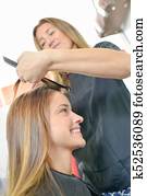 woman in hair salon woman in hair salon
