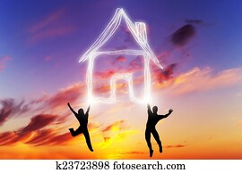 a, 夫妇, 跳跃, 同时，, 做, a, 房子, 符号, 在中, light., 新的家, mortgage.