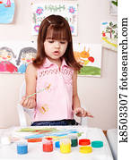 Child paint picture in preschool. Child paint picture in preschool.