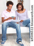 Couple fixing a budget