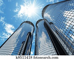High modern skyscrapers on a background of the blue sky and in solar patches of light High modern skyscrapers on a background of the blue sky and in solar patches of light