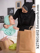 Muslim and caucasian women