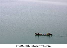 People rowing wherry