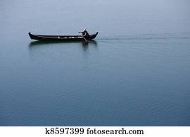 People rowing wherry