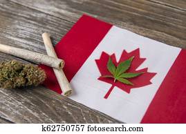 Canadian flag with assorted marijuana products Canadian flag with assorted marijuana products