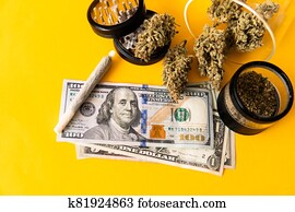 Marijuana weed bud and grinder. Indica medical health. Marijuana bud and banknotes of dollars. Marijuana weed bud and grinder. Indica medical health. Marijuana bud and banknotes of dollars.