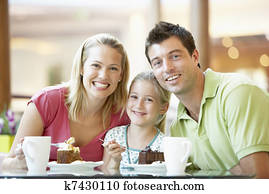 Family Having Lunch Together At The Mall