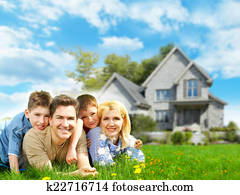 Happy family near new home.