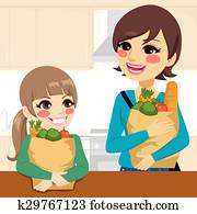 Daughter Helping Mother Carrying Groceries