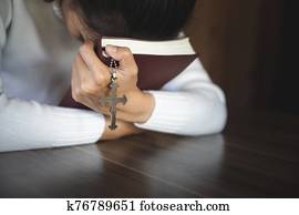 Woman praying in the morning. Christianity concept. Pray background. Faith hope love concept.