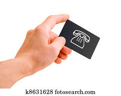 hand with a debit card isolated on white