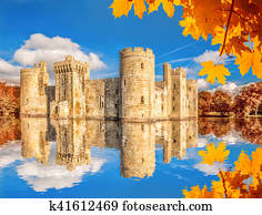 Historic Bodiam Castle with autumn leaves in East Sussex, England