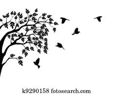 Tree silhouette with bird flying Tree silhouette with bird flying