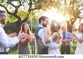 Bride and groom dancing at wedding reception outside in the backyard. Bride and groom dancing at wedding reception outside in the backyard.