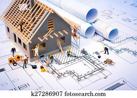 building house on blueprints building house on blueprints