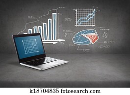 laptop computer with graph on screen laptop computer with graph on screen