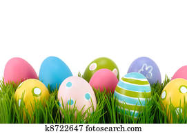 Easter colored eggs on the grass. Easter colored eggs on the grass.