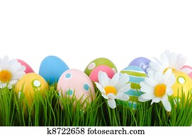 Easter colored eggs on the grass. Easter colored eggs on the grass.