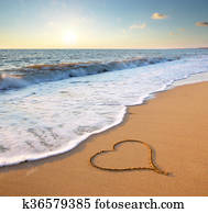 Heart on beach. 