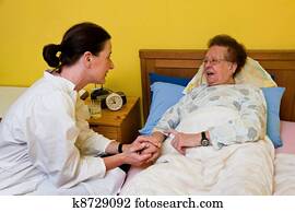nurses supervised old woman in a nursing home