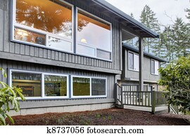 Split level brown grey house front exterior.