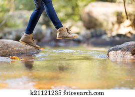 young woman hiking in mountain young woman hiking in mountain