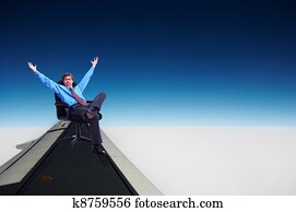 Happy relaxing businessman.