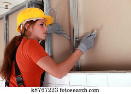 Female electrician at work Female electrician at work