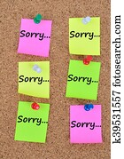 The word Sorry on notes