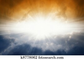 Bright sun in dark sky