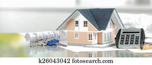 Miniature Home with Keys, Calculator and Blueprint Miniature Home with Keys, Calculator and Blueprint