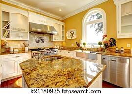 Bright yellow kitchen room with granite tops