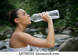 Woman drinking water Woman drinking water