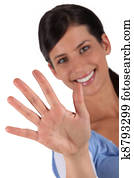 Woman holding up her hand