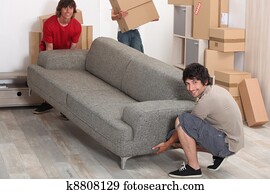 picture of friends moving a couch picture of friends moving a couch