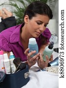Woman with her beauty products Woman with her beauty products
