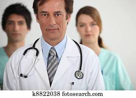 A doctor with his two interns