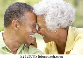 Portrait Of Senior Couple In Park