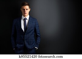 portrait of serious handsome male in trendy suit, isolated portrait of serious handsome male in trendy suit, isolated