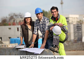 Three construction workers at site Three construction workers at site
