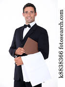 Well-dressed waiter holding menu