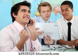 Young businessman rejoicing