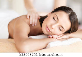beautiful woman in spa salon getting massage beautiful woman in spa salon getting massage