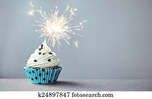 Cupcake with a sparkler Cupcake with a sparkler